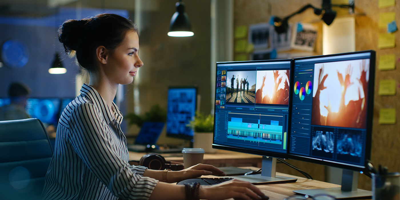 A person using video editing software on a computer