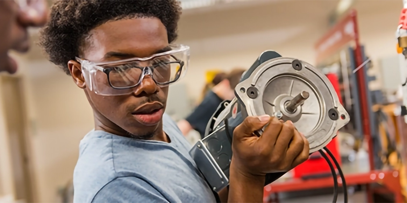 A man working on industrial machinery