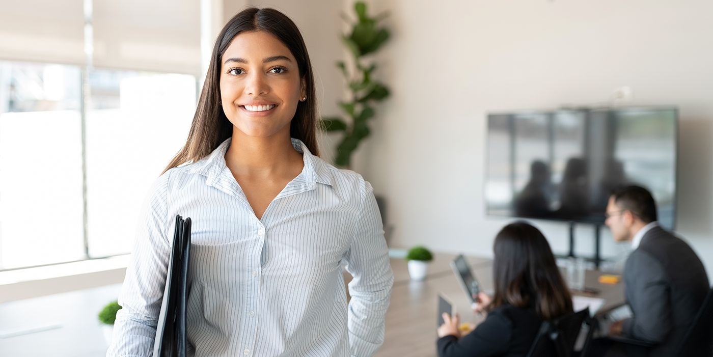 A young woman in an office setting
